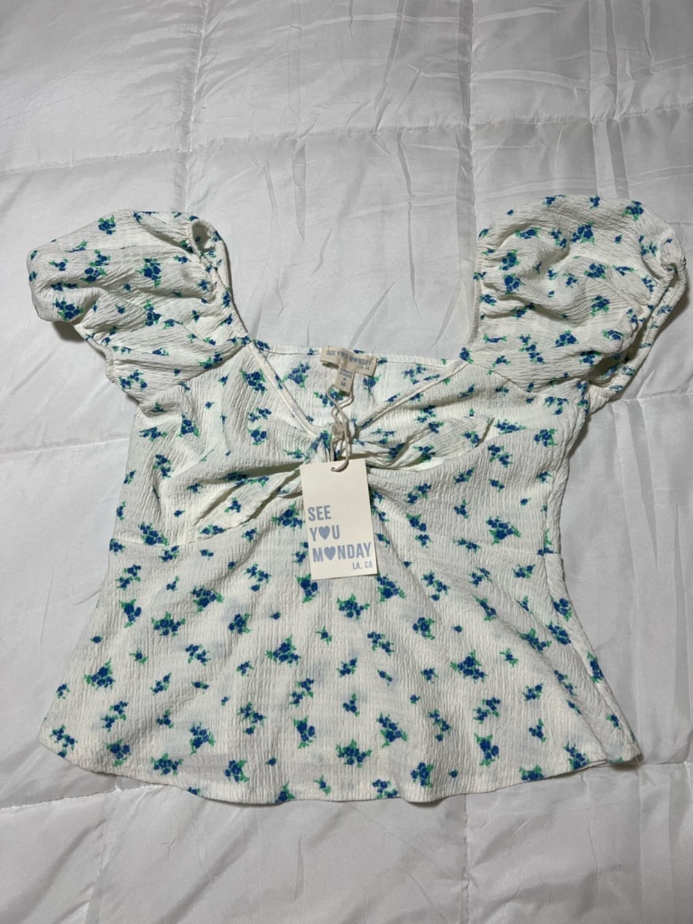 See You Monday White Top with Blue Floral Print and Green Accents